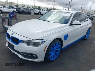 2017 BMW 3 Series 330e iPerformance with VIN WBA8E1C51HK895223, listed as a IAAI auction lot 41492625 with 116,486 mi miles. Bid and sale history available at carsss.com. Image 19.