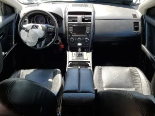 2015 Mazda CX-9 Touring with VIN JM3TB2CA6F0453398, listed as a Copart auction lot 55897115 with 167,563 mi miles and Salvage title. Bid and sale history available at DreamBid. Image 8.