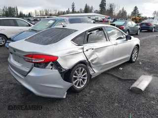 2017 Ford Fusion SE z VIN 3FA6P0HD2HR149699, wystawiony jako IAAI lot #41872383 z przebiegiem 95 587 mil mil oraz . Historia ofert i sprzedaży dostępna na DreamBid. Obrazek 4.