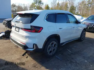 2025 BMW X1 xDrive28i with VIN WBX73EF02S5186420, listed as a IAAI auction lot 41841553 with 1,409 mi miles. Bid and sale history available at carsss.com. Image 4.