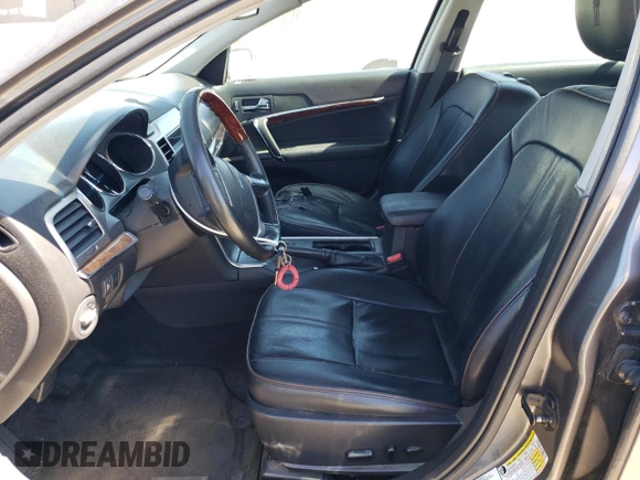 2012 Lincoln MKZ with VIN 3LNHL2GC4CR803061, listed as a Copart auction lot 63037905 with 149,235 mi miles and Salvage title. Bid and sale history available at DreamBid. Image 7.