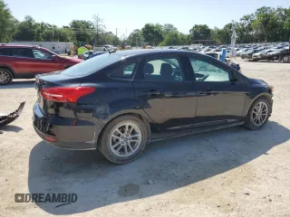 2018 Ford Focus SE z VIN 1FADP3FEXJL256542, wystawiony jako Copart lot #54583915 z przebiegiem 107 774 mil mil oraz Szkoda całkowita • Salvage title. Historia ofert i sprzedaży dostępna na DreamBid. Obrazek 3.