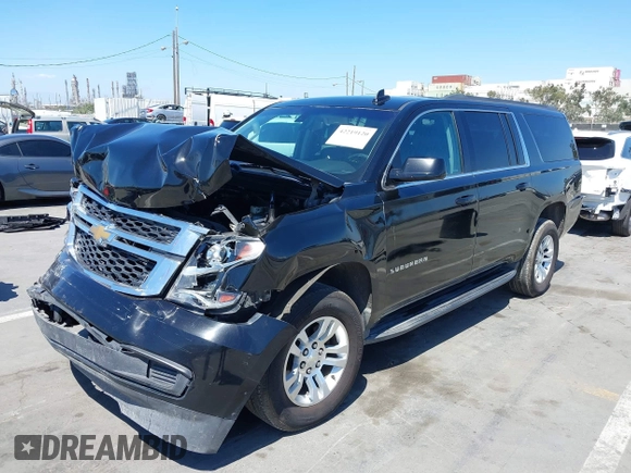 2018 Chevrolet Suburban LS z VIN 1GNSKGKC6JR150248, wystawiony jako IAAI lot #42219120 z przebiegiem 48 321 mil mil oraz . Historia ofert i sprzedaży dostępna na DreamBid. Obrazek 2.