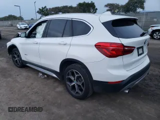 2018 BMW X1 sDrive28i with VIN WBXHU7C35J5H43995, listed as a Copart auction lot 71650602 with 80,437 mi miles. Bid and sale history available at carsss.com. Image 2.
