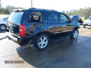 2009 Chevrolet Tahoe LTZ z VIN 1GNFK33049R297484, wystawiony jako IAAI lot #41305771 z przebiegiem 270 024 mil mil oraz . Historia ofert i sprzedaży dostępna na DreamBid. Obrazek 4.