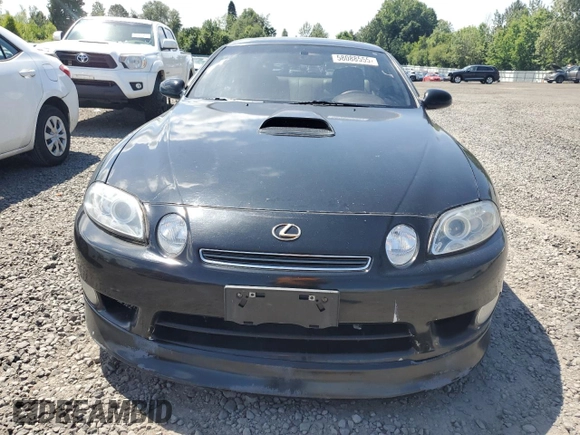1997 Lexus SC 400 z VIN JT8CH32YXV0052087, wystawiony jako Copart lot #58088555 z przebiegiem 171 685 mil mil oraz Tytuł czysty. Historia ofert i sprzedaży dostępna na DreamBid. Obrazek 5.