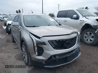 2022 Cadillac XT4 FWD Premium Luxury with VIN 1GYFZCR45NF164754, listed as a IAAI auction lot 41278705 with 65,698 mi miles. Bid and sale history available at carsss.com. Image 1.