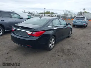 2013 Hyundai Sonata SE with VIN 5NPEC4ACXDH696923, listed as a IAAI auction lot 42088099 with 205,068 mi miles. Bid and sale history available at carsss.com. Image 4.