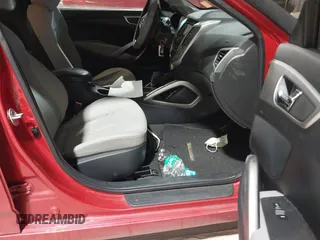 2013 Hyundai Veloster w/Gray Int with VIN KMHTC6AD2DU136990, listed as a IAAI auction lot 41363689 with 74,594 mi miles. Bid and sale history available at carsss.com. Image 5.