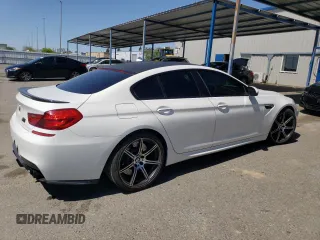 2015 BMW M6 z VIN WBS6C9C50FD467538, wystawiony jako Copart lot #52152245 z przebiegiem 65 483 mil mil oraz Czysty tytuł • Clean title. Historia ofert i sprzedaży dostępna na DreamBid. Obrazek 3.