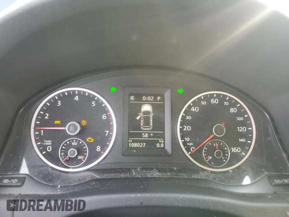 2013 Volkswagen Tiguan S with VIN WVGBV3AX0DW066778, listed as a Copart auction lot 85110984 with 108,027 mi miles and Salvage title. Bid and sale history available at DreamBid. Image 9.