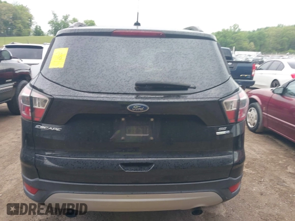 2017 Ford Escape SE with VIN 1FMCU9GD6HUB90367, listed as a IAAI auction lot 42088930 with 145,286 mi miles and . Bid and sale history available at DreamBid. Image 16.