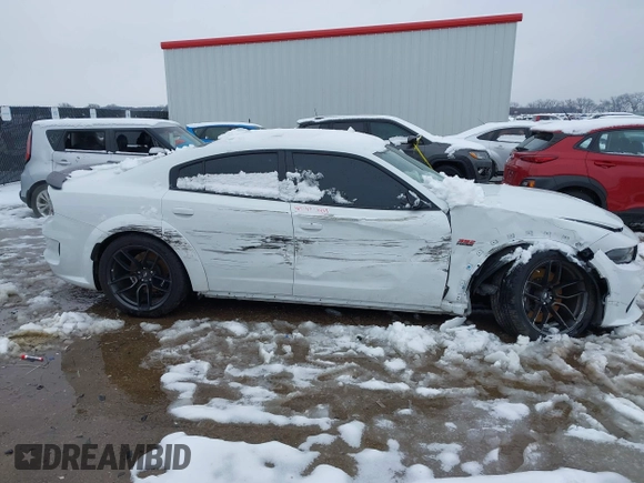 2022 Dodge Charger Scat Pack Widebody with VIN 2C3CDXGJ4NH183094, listed as a IAAI auction lot 41300119 with 31,800 mi miles and . Bid and sale history available at carsss.com. Image 6.