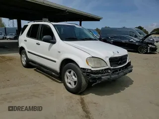 1999 Mercedes-Benz M 320/430/500 with VIN 4JGAB54E9XA130876, listed as a Copart auction lot 51714835 with 191,810 mi miles and Salvage Title. Bid and sale history available at DreamBid. Image 11.