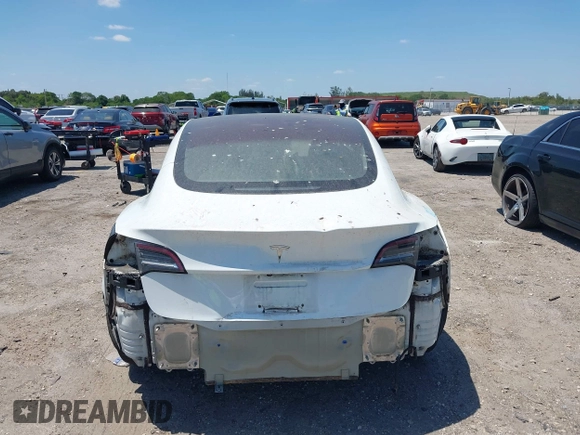 2018 Tesla Model 3 Long Range Battery with VIN 5YJ3E1EAXJF027179, listed as a IAAI auction lot 42059918 with 43,566 mi miles. Bid and sale history available at carsss.com. Image 17.
