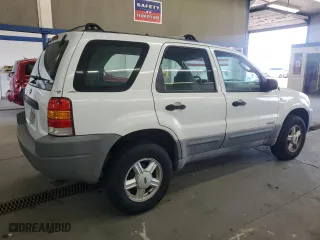 2001 Ford Escape XLS with VIN 1FMYU01181KF33553, listed as a Copart auction lot 52991765 with 214,453 mi miles and Clean Title. Bid and sale history available at carsss.com. Image 3.