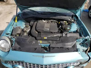 2002 Ford Thunderbird Hardtop Premium z VIN 1FAHP60A52Y128979, wystawiony jako Copart lot #68105854 z przebiegiem 58 146 mil mil oraz Nie do naprawy • Non repairable. Historia ofert i sprzedaży dostępna na DreamBid. Obrazek 11.
