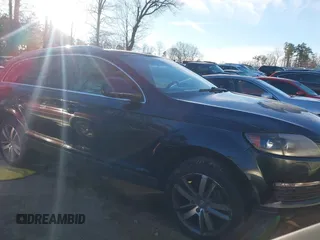 2009 Audi Q7 with VIN WA1AY74L09D023868, listed as a IAAI auction lot 41308776 with 176,541 mi miles. Bid and sale history available at carsss.com. Image 1.