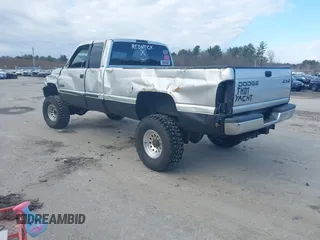 2001 Dodge 2500 with VIN 1B7KF23641J597636, listed as a IAAI auction lot 41843898 with 257,007 mi miles. Bid and sale history available at carsss.com. Image 3.