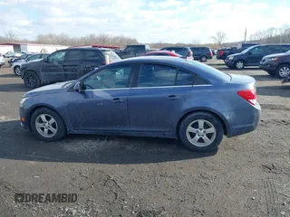 2014 Chevrolet Cruze 1LT with VIN 1G1PC5SB9E7323441, listed as a IAAI auction lot 41400152 with 134,594 mi miles and . Bid and sale history available at DreamBid. Image 14.