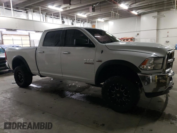 2015 Ram 2500 SLT with VIN 3C6TR5DT2FG547495, listed as a Copart auction lot 82915364 with 131,370 mi miles and Salvage Title. Bid and sale history available at carsss.com. Image 4.