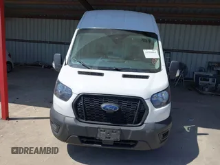 2022 Ford Transit Cargo with VIN 1FTBW3X89NKA69141, listed as a IAAI auction lot 41980864 with 102,721 mi miles and . Bid and sale history available at DreamBid. Image 12.