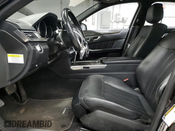 2014 Mercedes-Benz E 550 Sport with VIN WDDHF9BBXEA883116, listed as a Copart auction lot 50395055 with 124,022 mi miles and Clean Title. Bid and sale history available at DreamBid. Image 7.