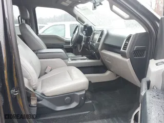 2015 Ford F-150 XLT with VIN 1FTEW1E83FFB17943, listed as a IAAI auction lot 41560117 with 117,024 mi miles. Bid and sale history available at carsss.com. Image 5.