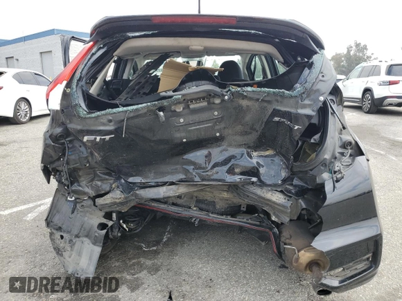 2018 Honda Fit Sport z VIN 3HGGK5H65JM702183, wystawiony jako Copart lot #55439775 z przebiegiem Nie podano mil oraz Szkoda całkowita • Salvage title. Historia ofert i sprzedaży dostępna na DreamBid. Obrazek 6.