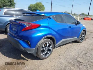2018 Toyota C-HR XLE z VIN NMTKHMBX7JR004448, wystawiony jako IAAI lot #42785933 z przebiegiem 112 115 mil mil oraz . Historia ofert i sprzedaży dostępna na DreamBid. Obrazek 4.