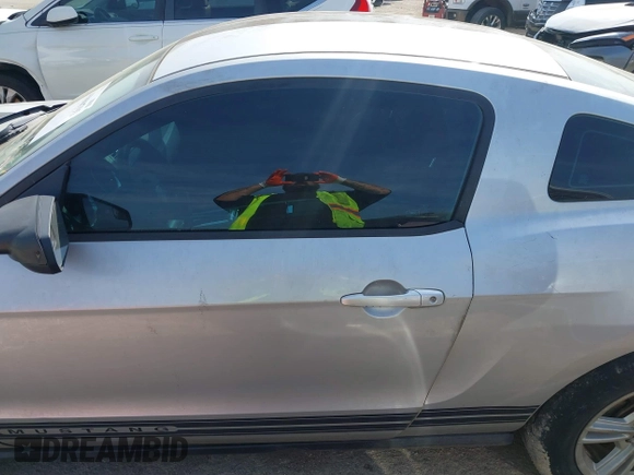 2012 Ford Mustang Premium with VIN 1ZVBP8AM5C5234532, listed as a IAAI auction lot 41860791 with 106,929 mi miles and . Bid and sale history available at DreamBid. Image 14.