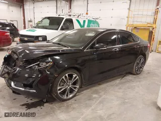 2019 Ford Fusion Titanium with VIN 3FA6P0K93KR269569, listed as a IAAI auction lot 41811177 with 110,231 mi miles. Bid and sale history available at carsss.com. Image 2.