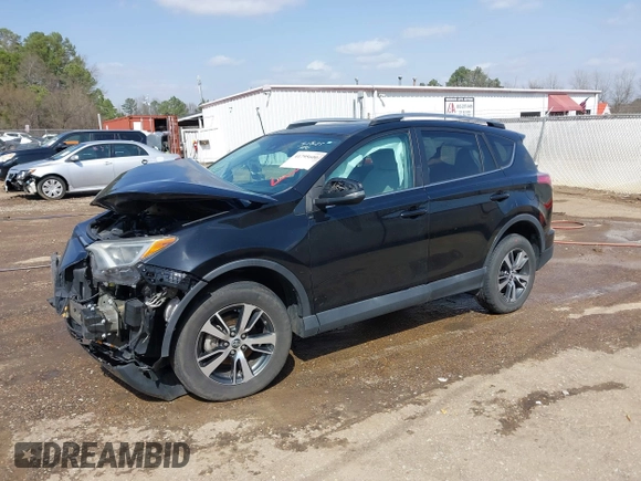2018 Toyota RAV4 XLE with VIN 2T3WFREVXJW444002, listed as a IAAI auction lot 41795600 with 115,120 mi miles. Bid and sale history available at carsss.com. Image 17.