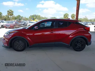 2018 Toyota C-HR XLE with VIN NMTKHMBX0JR058660, listed as a IAAI auction lot 41929790 with 136,358 mi miles. Bid and sale history available at carsss.com. Image 14.