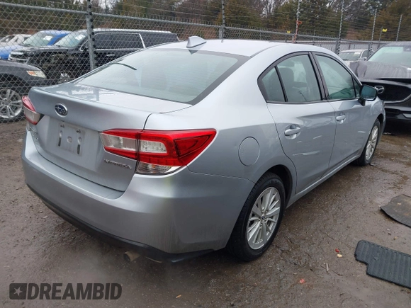 2018 Subaru Impreza Premium z VIN 4S3GKAD64J3600582, wystawiony jako IAAI lot #41456372 z przebiegiem 87 266 mil mil oraz . Historia ofert i sprzedaży dostępna na DreamBid. Obrazek 4.