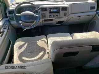 1999 Ford F-350 XL with VIN 1FTSW31S2XEE89071, listed as a Copart auction lot 61016685 with 115,130 mi miles and Salvage title. Bid and sale history available at DreamBid. Image 8.