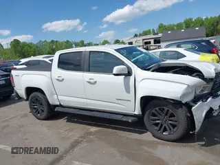 2019 GMC Canyon 4WD SLE z VIN 1GTG6CENXK1319647, wystawiony jako IAAI lot #42039568 z przebiegiem 56 371 mil mil oraz . Historia ofert i sprzedaży dostępna na DreamBid. Obrazek 14.