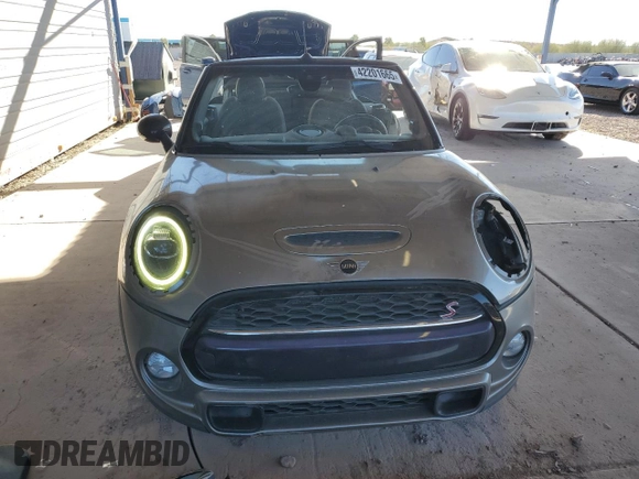 2019 MINI Convertible Cooper S с VIN WMWWG9C54K3E40225, выставлен на аукционе Copart как лот 42201665 с пробегом 56 749 миль миль и Списание • Salvage title. История ставок и продаж доступна на DreamBid. Изображение 5.