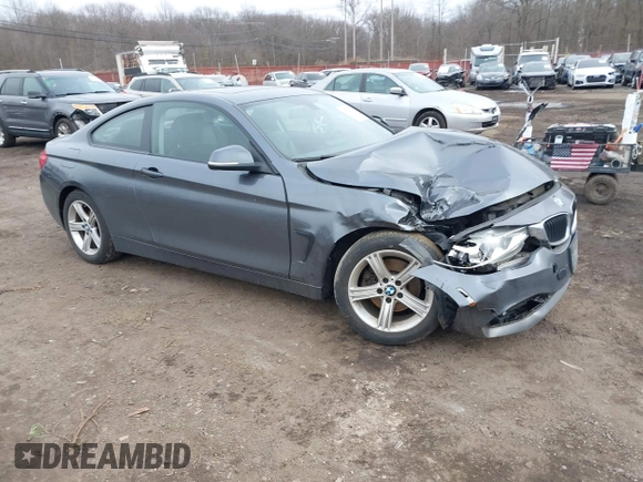 2014 BMW 4 Series 428i xDrive with VIN WBA3N9C50EK246002, listed as a IAAI auction lot 41612256 with 100,915 mi miles and . Bid and sale history available at carsss.com. Image 1.