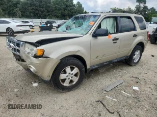 2012 Ford Escape XLT with VIN 1FMCU0D75CKA33265, listed as a Copart auction lot 63556215 with 149,584 mi miles and Salvage title. Bid and sale history available at DreamBid. Image 1.