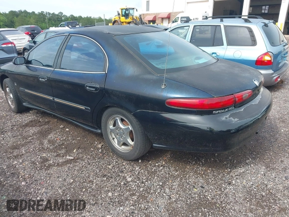 1999 Mercury Sable LS Premium Group z VIN 1MEFM53S7XA632876, wystawiony jako IAAI lot #42303137 z przebiegiem 178 617 mil mil oraz . Historia ofert i sprzedaży dostępna na DreamBid. Obrazek 3.