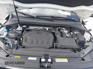 2024 Volkswagen Tiguan SE R-Line Black with VIN 3VVCB7AX6RM093792, listed as a IAAI auction lot 42117670 with 15,379 mi miles and . Bid and sale history available at DreamBid. Image 10.