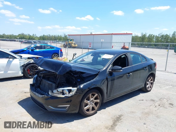 2014 Volvo S60 T5 with VIN YV1612FS1E2294154, listed as a IAAI auction lot 42046636 with 165,257 mi miles. Bid and sale history available at carsss.com. Image 12.