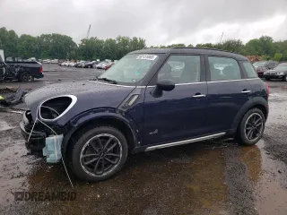 2016 MINI Countryman S with VIN WMWZC5C50GWU03709, listed as a Copart auction lot 60151065 with 106,913 mi miles and Salvage title. Bid and sale history available at DreamBid. Image 1.