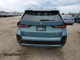 2023 BMW X1 xDrive28i with VIN WBX73EF02P5W11223, listed as a Copart auction lot 49205155 with 17,083 mi miles and Salvage Title. Bid and sale history available at DreamBid. Image 6.