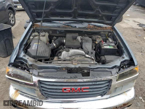 2007 GMC Canyon Work Truck with VIN 1GTDT19E778141575, listed as a Copart auction lot 73715704 with 102,072 mi miles and Salvage Title. Bid and sale history available at carsss.com. Image 11.