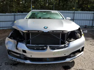 2018 BMW 7 Series 750i with VIN WBA7F0C53JGM22810, listed as a Copart auction lot 72796303 with 63,047 mi miles. Bid and sale history available at carsss.com. Image 5.
