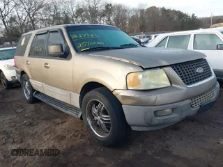 2003 Ford Expedition XLT Value with VIN 1FMPU16W83LA58988, listed as a IAAI auction lot 41627386 with 999,999 mi miles. Bid and sale history available at carsss.com. Image 1.