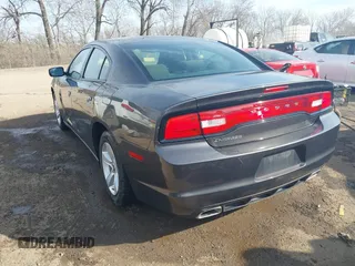 2014 Dodge Charger SE with VIN 2C3CDXBG7EH147959, listed as a IAAI auction lot 41773645 with 142,231 mi miles and . Bid and sale history available at carsss.com. Image 3.