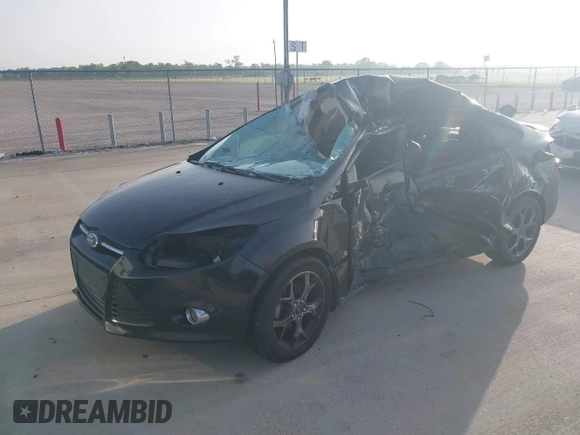2013 Ford Focus SE z VIN 1FADP3F20DL361861, wystawiony jako IAAI lot #42652227 z przebiegiem 104 502 mil mil oraz . Historia ofert i sprzedaży dostępna na DreamBid. Obrazek 2.
